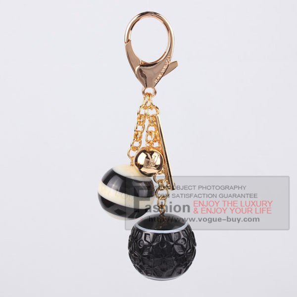 Louis Vuitton replica Mini Lin bag charm M65699